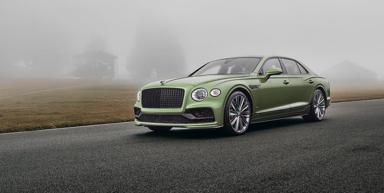 a green bentley flying spur speed