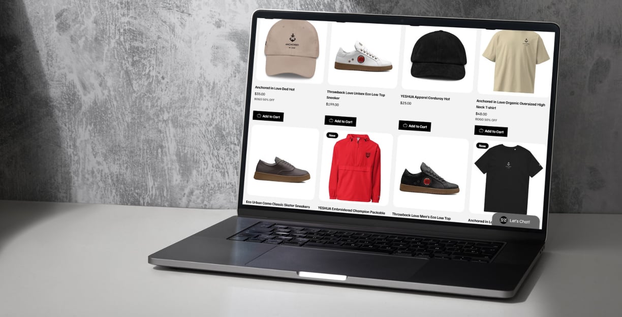 a laptop computer screen displaying YESHUA Apparel products