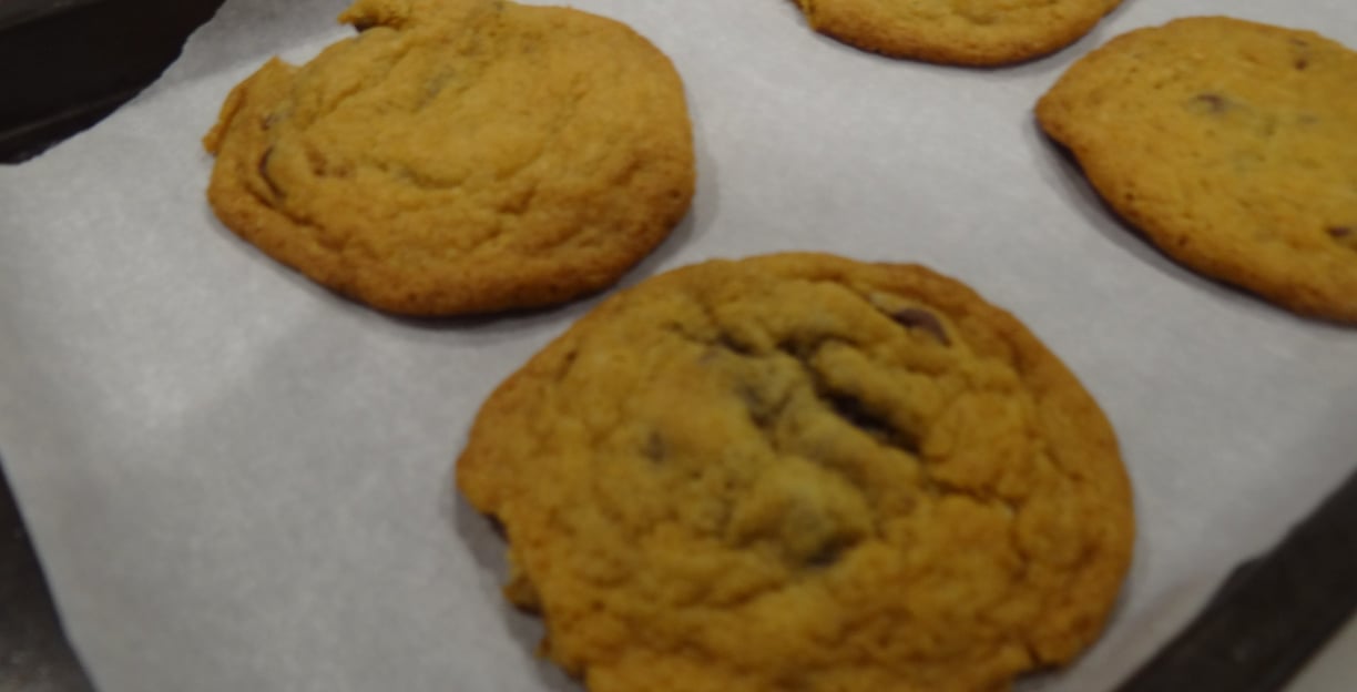 a tray of cookies and chocolate chip cookies