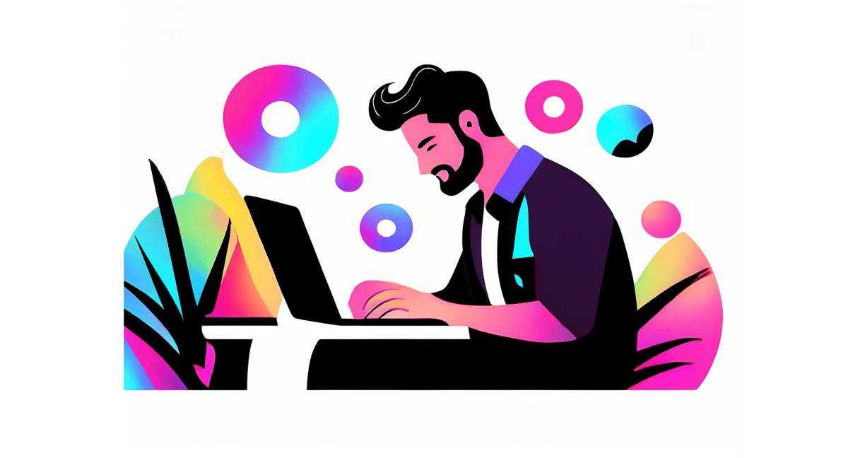 a man sitting at a laptop computer
