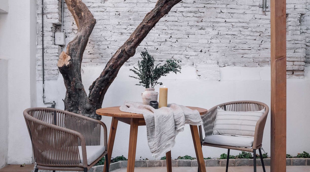 Outdoor terrace with seating, offering a serene atmosphere in Barcelona apartment