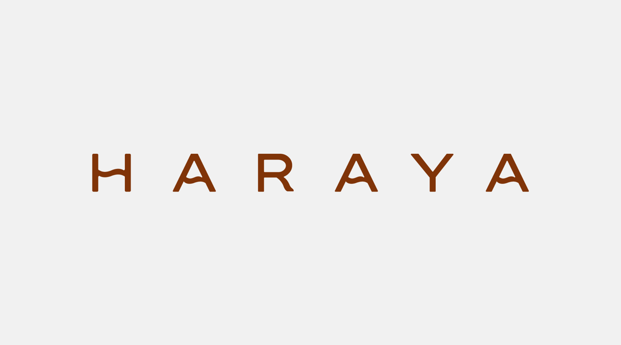 a brown logo on a white background