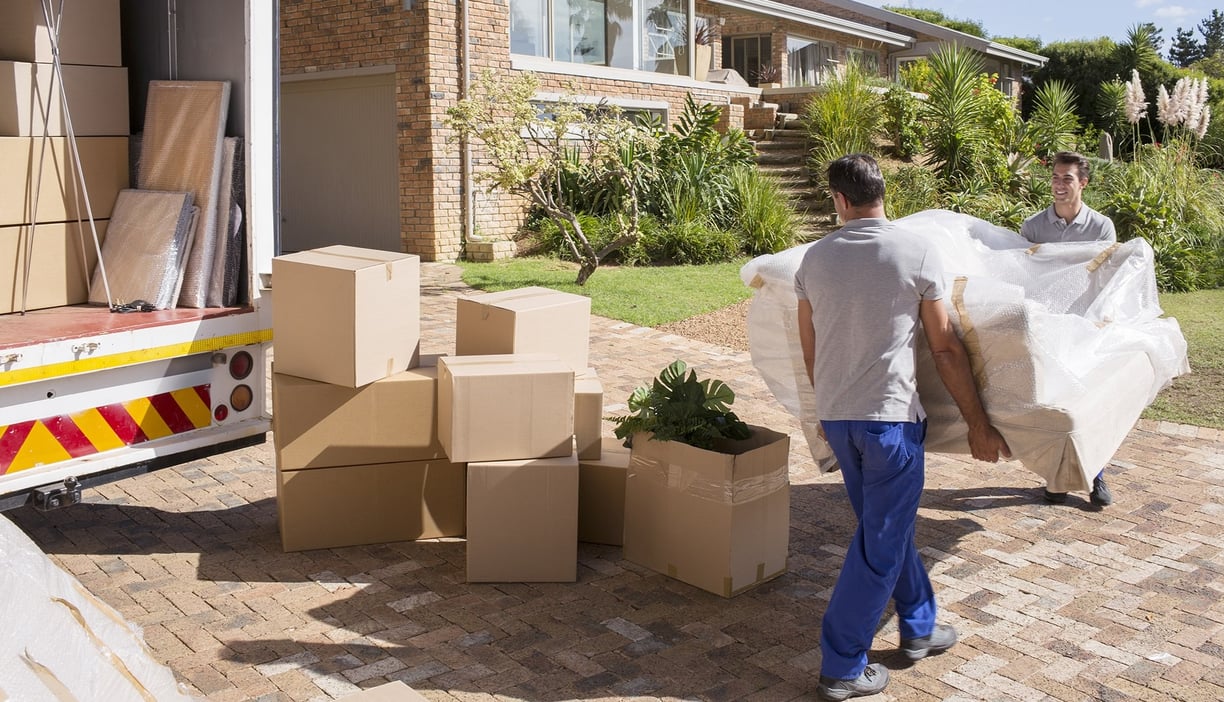 Professional Moving Men with Sofa and boxes