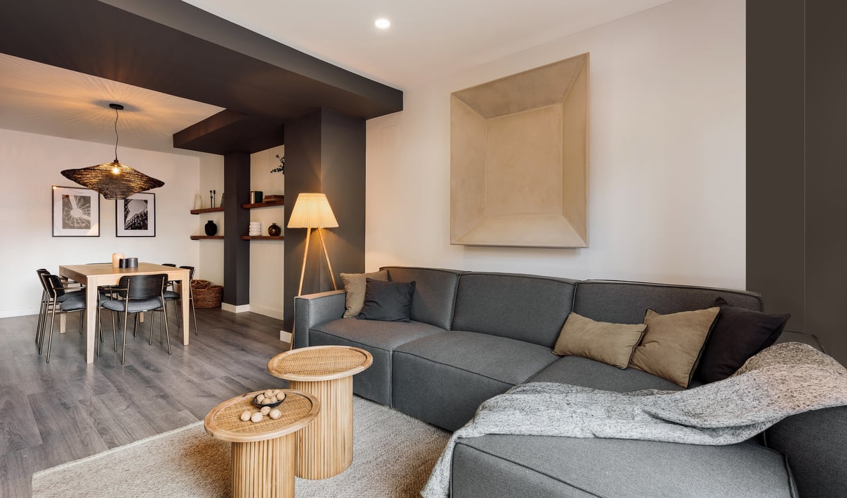 Vibrant living room with natural materials, bold colors, and modern design elements