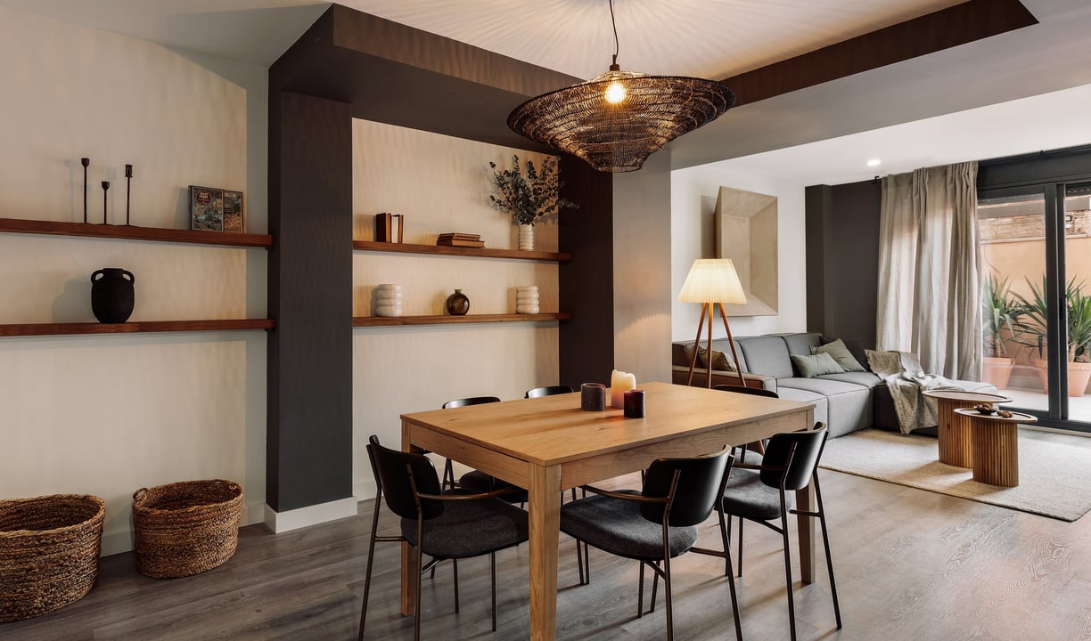 Stylish dining area with contemporary furniture, neutral tones, and a cozy interior design by SAVIA