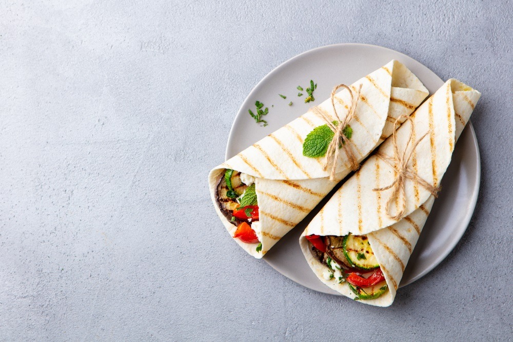 Multigrain tortilla wrap which is also high in protein and high in carb . healthy snacks