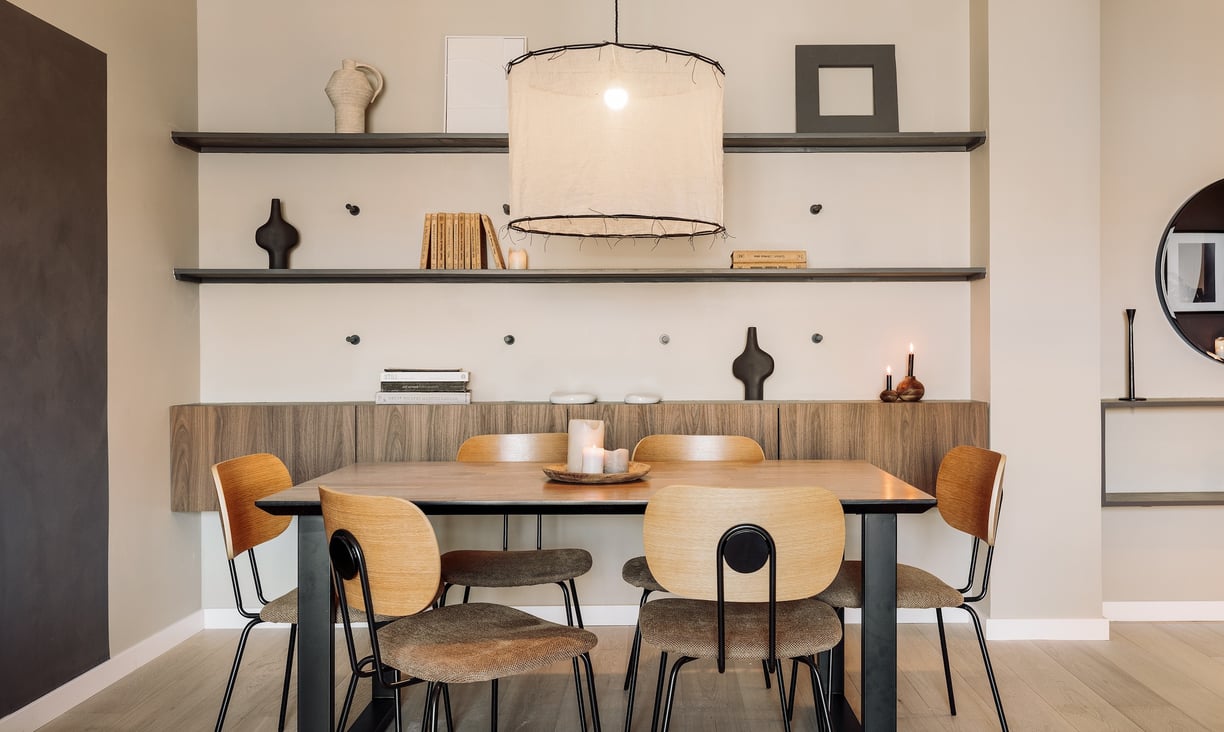Contemporary dining area with bold color accents and clean lines design by SAVIA