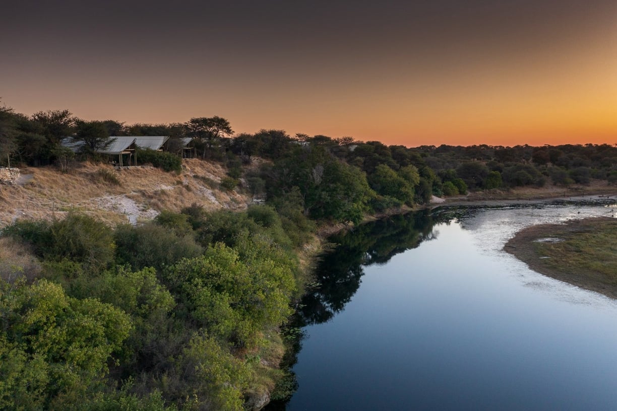 View over Meno-A-Kwena Tented Camp with the Boteti river Botswana