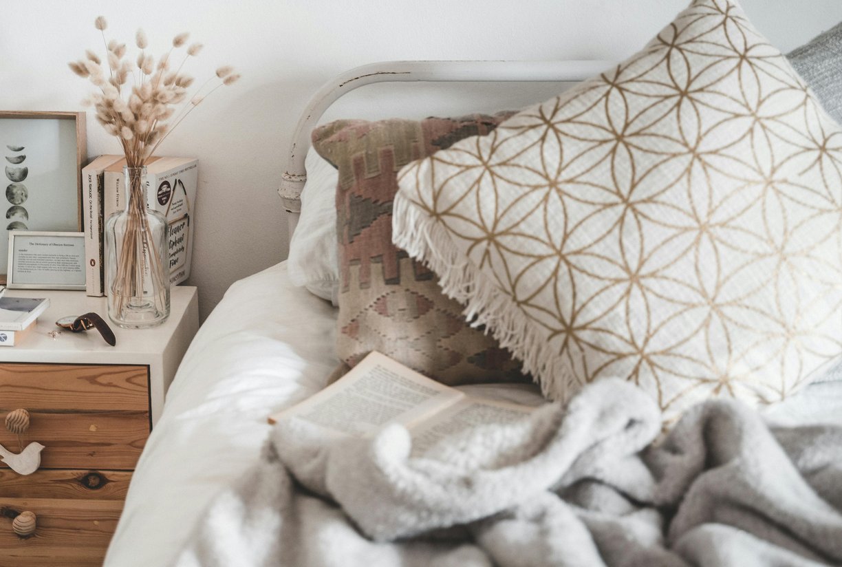 White and Brown Throw Pillow on White Bed by Taryn Elliott From Pexels