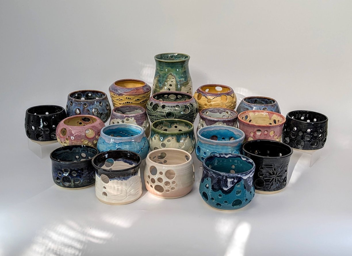 A collection of GonPotty ceramic tealights