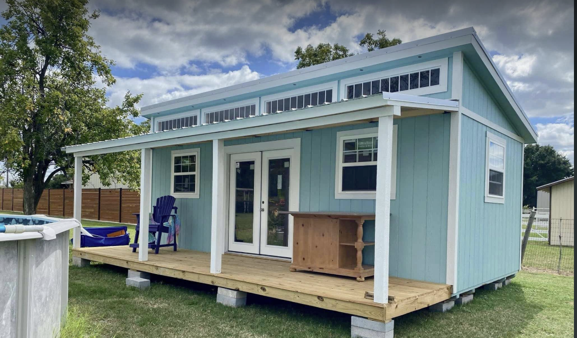 Studio shed with front porch and French doors