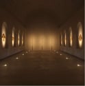 Lámparas de pared CRONEK Linea en pasillo largo, creando iluminación ambiental cálida