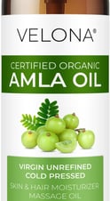 a bottle of organic amla oil