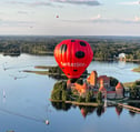 hot air balloon over trakai 