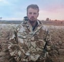 Photo of founder Jamie Lennon during his military days