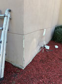 damaged and dented stucco
