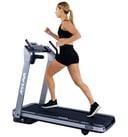 women running on treadmill