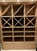 Meuble pour en bois pour ranger le vin fait par Laroux Menuiserie