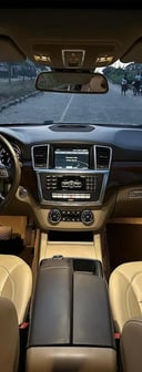 a car dashboard with a dashboard and a steering wheel