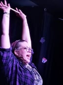 Hands up drumming on stage