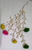 "Handmade shell hair tassel with colorful artificial flower ends–tribal-inspired accessory-Designed for export"