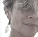 a woman with a cell phone in her hand
