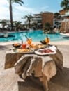 Business resort with a tropical setting with fruits and food