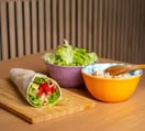 vegetable-wrap-on table-beside-two-bowls