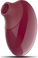 a red and purple object with a cat on it