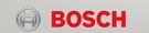 Close-up image of a stainless steel Bosch dishwasher with the Bosch logo prominently displayed