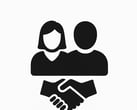 a person shaking hands with a person in the background