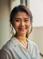 a woman in a white shirt and a white shirt
