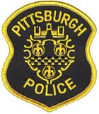 Pittsburgh Police yellow and black logo badge