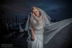 Nuit à Venise avec une marié blonde avec le voile au vent