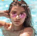 woman in pink shades in a pool