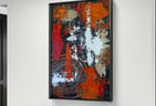 Acrylbild "Ring of Fire" von Wigulins Art an der Wand hängend