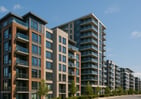 a row of apartment buildings with a street light in the foreground, condominiums in montreal