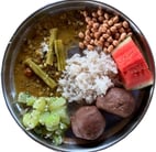 a plate of food with rice, beans, and vegetables showing Yogic food