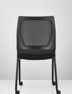 V137 all-black mesh visitor chair with castors, rear view
