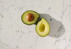 sliced-green-fruit-on-white-surface