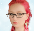 a woman with pink hair and glasses on her face