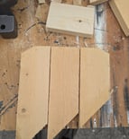 Wood scraps laid out in a pattern