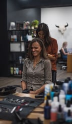 Bride getting hair done at the trademark hair company