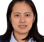 a woman in a blue jacket and a blue shirt