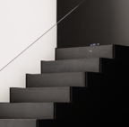 Stairs leading to success - A symbolic representation of progression and growth in the business.