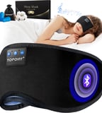 a woman in a sleep mask with a bluetoothed eye mask