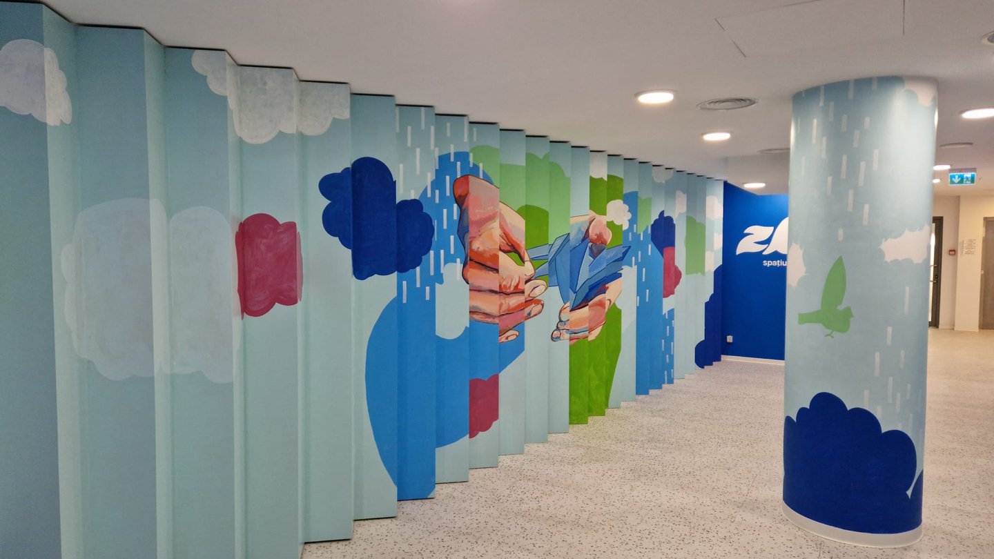 Decor mural creativ cu nori pentru spații studenti.