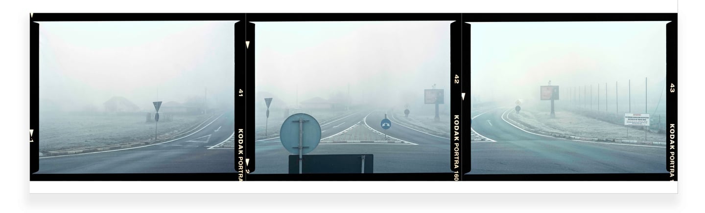Composite photograph  of a foggy road junction with traffic signs, each frame revealing a unique part of the narrative.