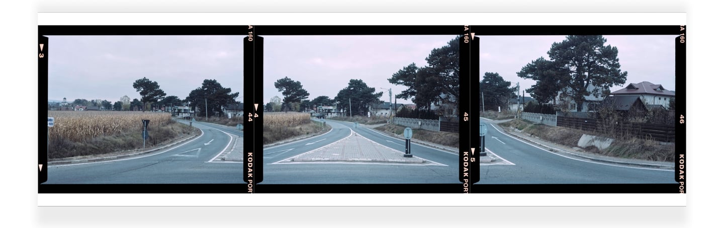 Composite color photograph of a road intersection with traffic signs and a field with tall grasses