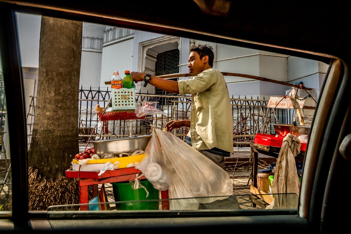 A street vendor of local snacks in Myanmar's capital, Yangon